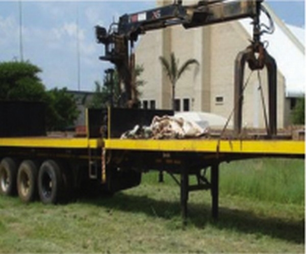 Payloader tri-axle brick apllication semi