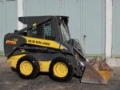 New Holland Kompaktlader NEW HOLLAND LS 160 mit Fronttür, Kompaktni nakladalci, Gradbeništvo