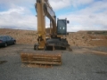 Caterpillar M 318, Kolesové rýpadlá, Stavebníctvo