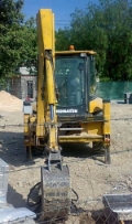 Komatsu WB97R, Graaf-laadcombinaties, Bouw