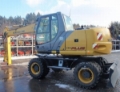 NEW HOLLAND MH PLUS、ホイル式パワーショベル、建設