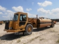 Caterpillar 613C, Camion citerne, Transport