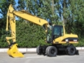 Caterpillar М318С, Gumikerekes kotrók, Építőipari gépek