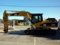 Caterpillar 323DL, Escavatori cingolati, Costruzioni